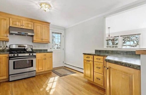 East Haven House | Experience coastal living! This home features water views on every level.