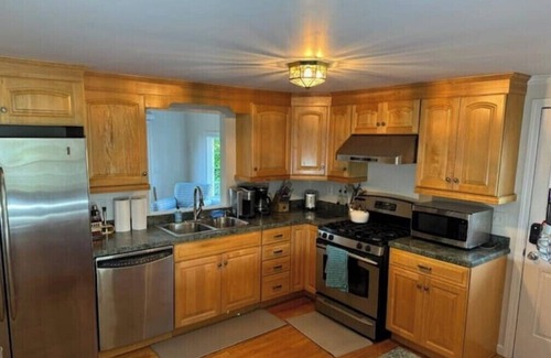 East Haven House | Experience coastal living! This home features water views on every level.