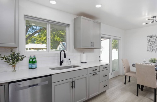 Burley House | Experience elevated comfort in this thoughtfully designed retreat. Featuring two inviting bedrooms, a fully equipped kitchen, and serene details, it blends simplicity with style for a clean, welcoming stay.