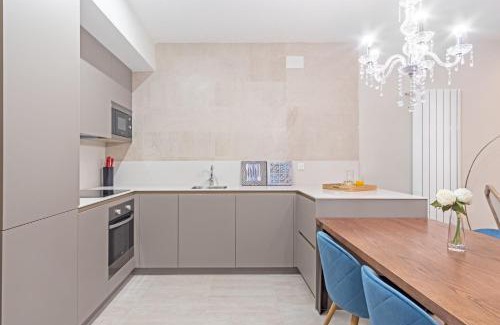 Justicia Apartment | Experience the best of Madrid! Gran Vía Apartment for 6, comfort and style in the heart of Chueca III