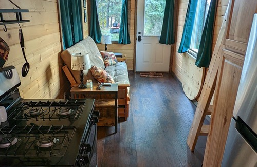 Post Falls Apartment | Experience Tiny Cabin Living. Close to recreational activities.