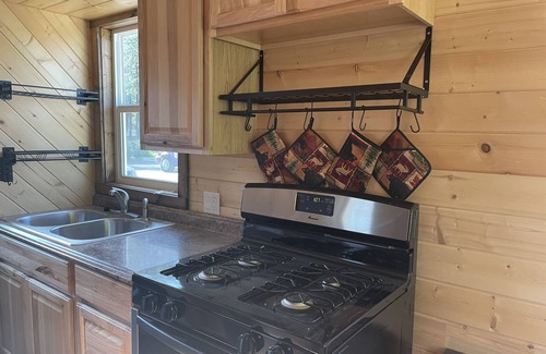 Post Falls Apartment | Experience Tiny Cabin Living. Close to recreational activities.