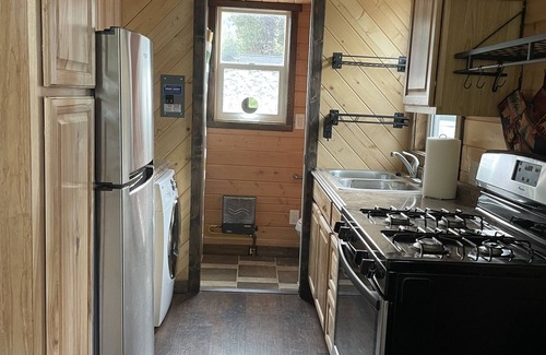Post Falls Apartment | Experience Tiny Cabin Living. Close to recreational activities.