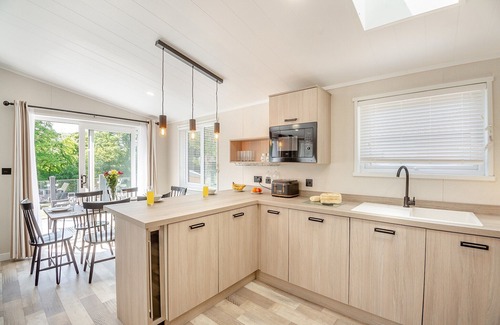 Bethesda Ski Chalet | Experience ultimate luxury with the brand-new Faraday lodge with hot tub.