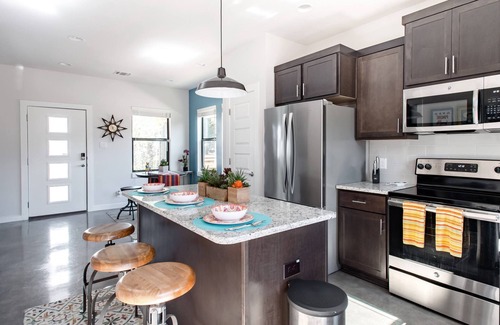 Eastside Promise Neighborhood House | Explore the River Walk from Artsy Designer Retro Chic Home