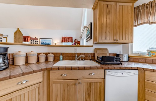 Gold Beach House | Exquisite home with spectacular views, deck, gas fireplace & game room