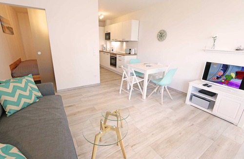Thiessow Apartment | F: House Windrose Whg 03 Beach oasis with terrace - House Windrose Whg 03