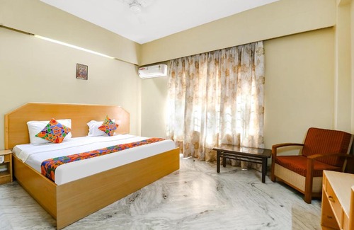 Krishnarajapura Hotel | FabExpress Sri Sathya Sai