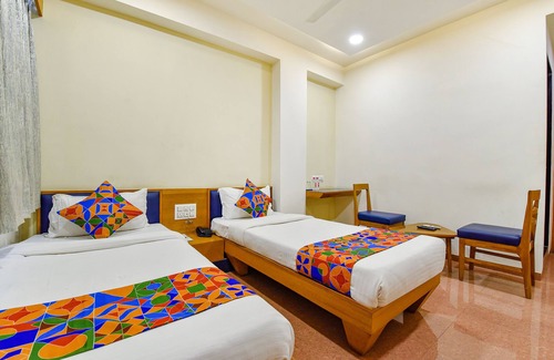 Changodar Hotel | Fabhotel Prime Grand Unity