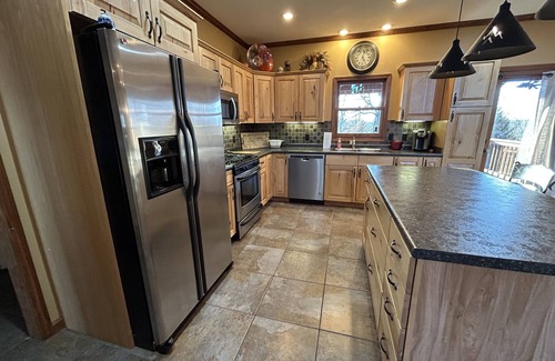 Springville House | Fabulous Lakeview home with stone fireplace located in Springville/Buchanan