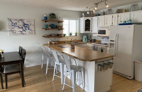 Village of Four Seasons Condo | Fabulous Waterfront Condo with Boatslip!