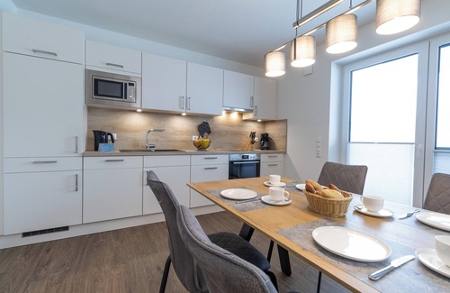 Dorumer Neufeld Apartment | Familienfreundliche Wohnung mit Sauna und Garten