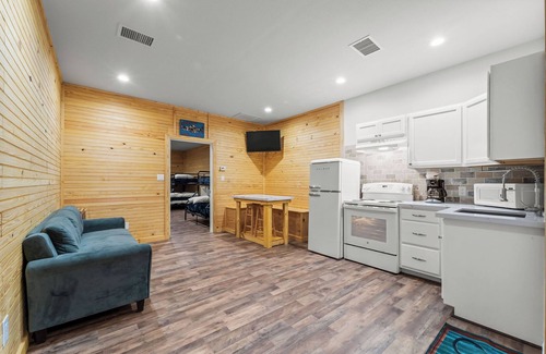 Cedar Lane Cabin | Family and pet friendly creek access with RV Hook up.
