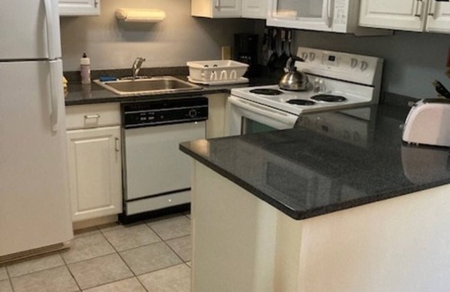Weirs Beach Condo | Family condo in the center for all season fun.