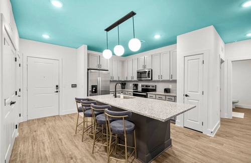 Upper Grand Lagoon Apartment | Family-Friendly Poolside Getaway 3BR near PCB