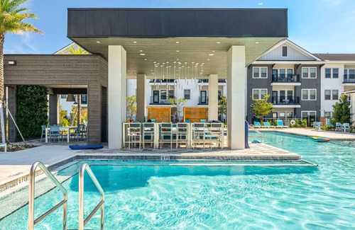 Upper Grand Lagoon Apartment | Family-Friendly Poolside Getaway 3BR near PCB