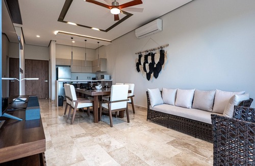 Playa Paraiso Condo | Family-friendly coastal condo with rooftop pool, fire pits & market