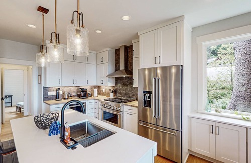 Tolovana Park House | Family-friendly home w/spacious deck, gas fireplace, & ocean view