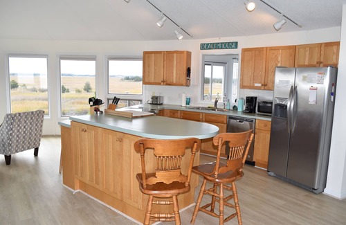Broadkill Beach House | Family friendly home w/ 360 views of the bay and wild life preserve (sleeps 12)