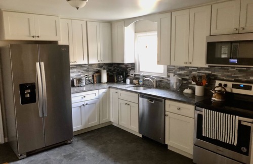 Lenox House | Family friendly house with two complete units, private deck and yard.