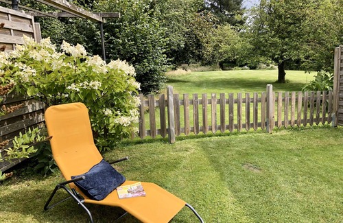 Grundhof Apartment | Family-friendly Krischan vacation apartment with quiet, fenced garden.