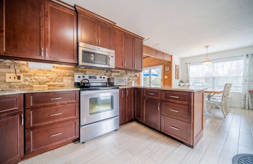 Mount Mourne House | Family-friendly lakefront retreat. 8 Kayaks, porch swings, grill, private dock.
