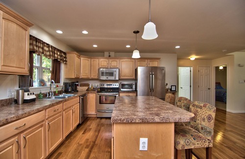 Rowland House | Family-friendly Modern Mountain Getaway with open floor plan and large deck