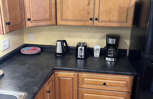 Southern Coast Condo | Family friendly serene house close to beaches, sleeps 8, lot off street parking