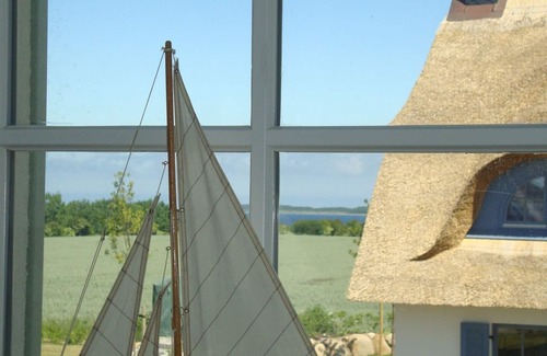 Zierow House | Family friendly thatched cottage with 2 bedrooms, fireplace, trampoline & football goal