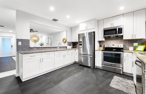 Coral Heights House | Family Home w/Htd POOL great location! - AQUA.life