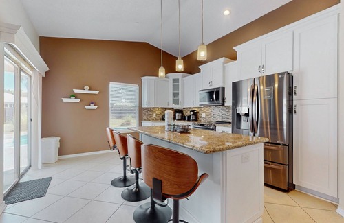 Emerald Shores House | Family home with pool, large fenced-in yard, WiFi, central AC - dog-friendly