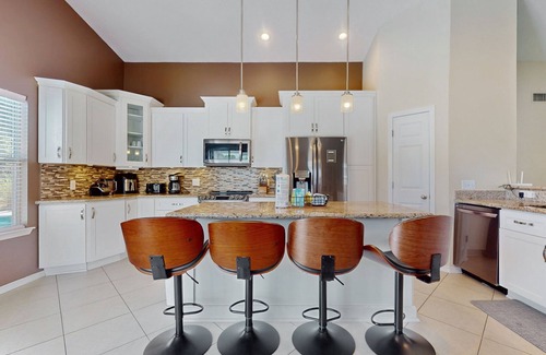 Emerald Shores House | Family home with pool, large fenced-in yard, WiFi, central AC - dog-friendly