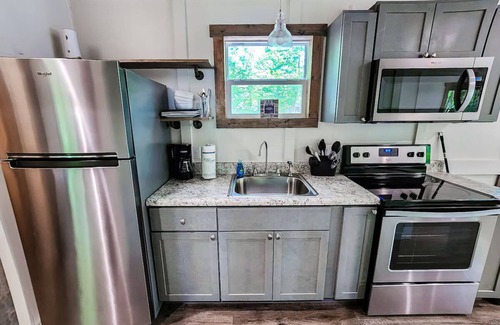 Guntersville Apartment | Family Retreat Tiny House - 670+ acres private property on Lake Guntersville!