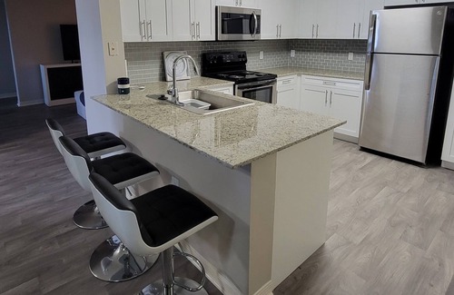 West Shore Apartment | Family sized condo near to Sawgrass mall, Fort Lauderdale Airport