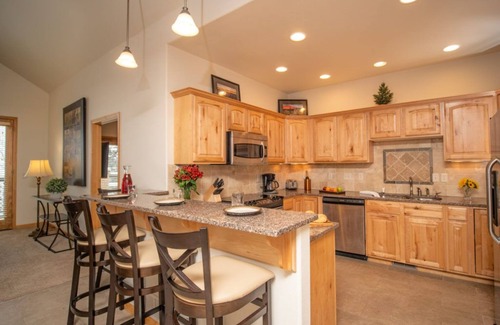 Stanley Hills Condo | Family-sized condo with large deck, private hot tub, and bunk beds!