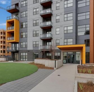 Currie Barracks Apartment | Family Stylish 2BR Condo with City View, DT, Balcony, Free Parking & In-Suite Laundry!