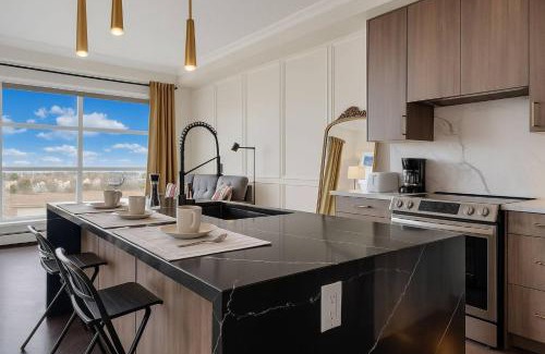 Currie Barracks Apartment | Family Stylish 2BR Condo with City View, DT, Balcony, Free Parking & In-Suite Laundry!