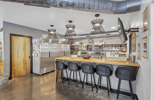 Pacific Hotel | Family suite with full kitchen and laundry on the second floor of The Landing Hub Boutique Hotel