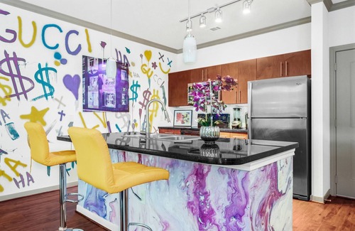 South Main Apartment | Fancy Purple Las Vegas Hotel Theme w/Arcade Games