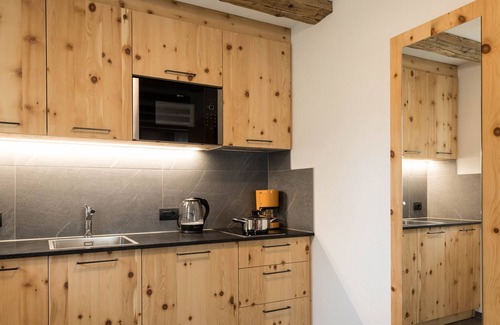 Mantana Apartment | Fanes - Chalet Dolomit with Garden, Balcony, Mountain View & Wi-Fi; Parking Available
