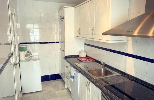 El Portil House | Fantastic 3-Bedroom Holiday Home including Tennis and Pool Near Golf Course