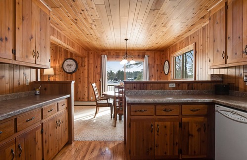 Manitowish Waters House | Fantastic waterfront abode with wraparound deck, dock, & WiFi - dog-friendly