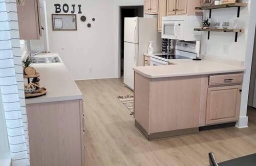 Arnolds Park House | Fantastic Yard and Fun Location In Arnolds Park. Walk to Everything!