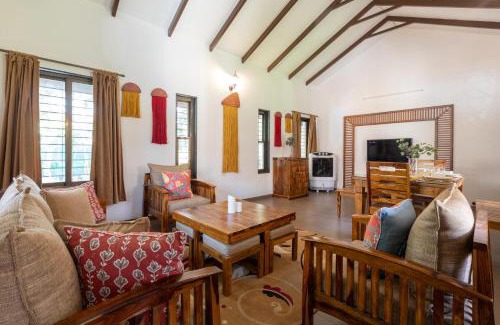 Nashik Villa | Farmhouse Retreat by StayVista - Classic architecture, Rustic interiors, Cozy rooms & A refreshing swimming pool