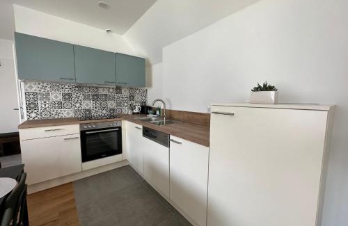 Stuwerviertel Apartment | FeelHome-Dachterrasse-4 Gäste-WiFi
