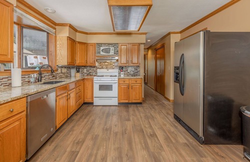 Wichita House | Fenced Patio W/POOL, Game Room, & Home Gym!
