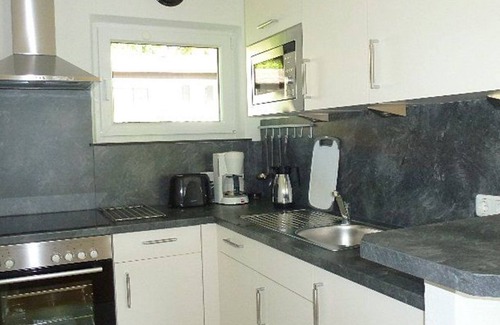 Schwarzenbach House | Ferienhaus 07-f Modern Eingerichtet mit Sonnenterrasse - Ferienhäuser im Feriendorf Weissensee im