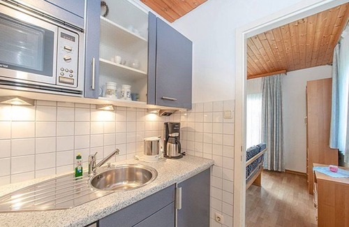 Schwarzenbach House | Ferienhaus 28-f mit Südterrasse mit Bergblick - Ferienhäuser im Feriendorf Weissensee im Allgäu