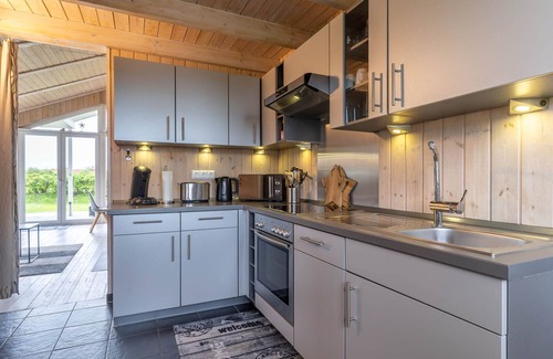 Wesselburenerkoog House | Ferienhaus mit Strandkorb, Kaminofen, Whirlpool und Sauna