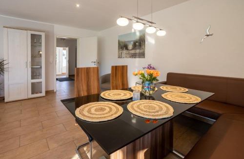 Tossens Apartment | Ferienhaus Robbenglück - viel Platz für Generationen und Freunde